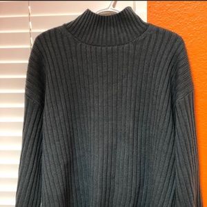 Distressed turtle neck sweater